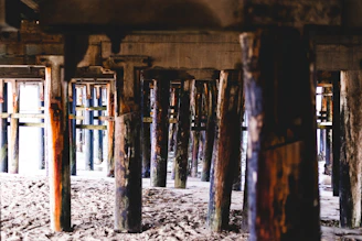 Structural inspection focusing on wooden beams and support integrity