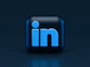 A blue LinkedIn logo icon on a dark blue background