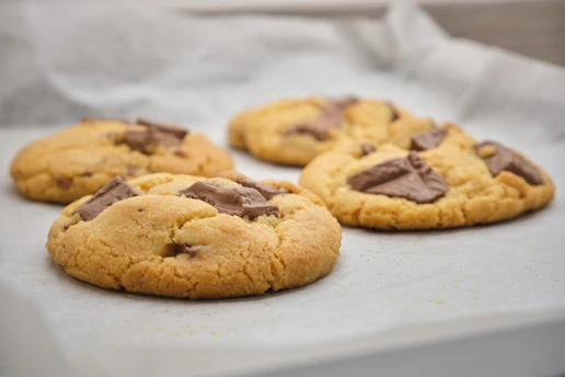 brown cookies on white paper