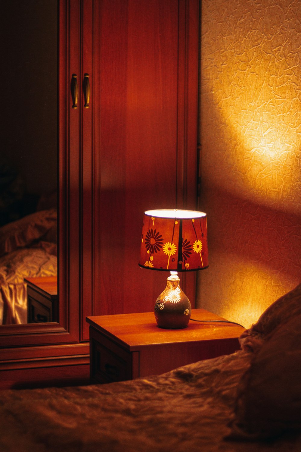 brown and white table lamp on brown wooden table