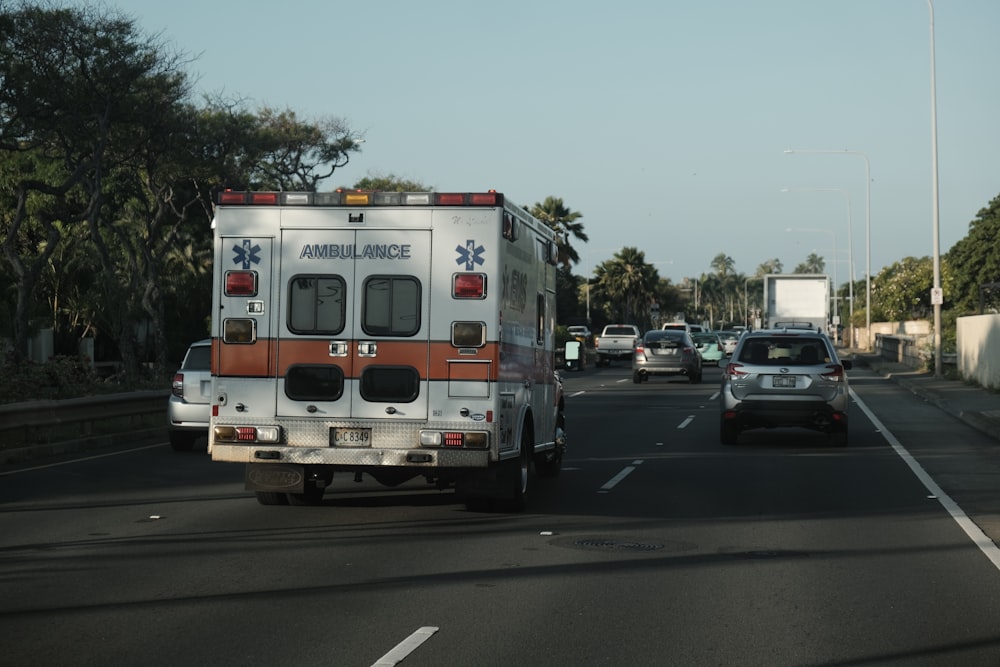 white and red van on road during daytime