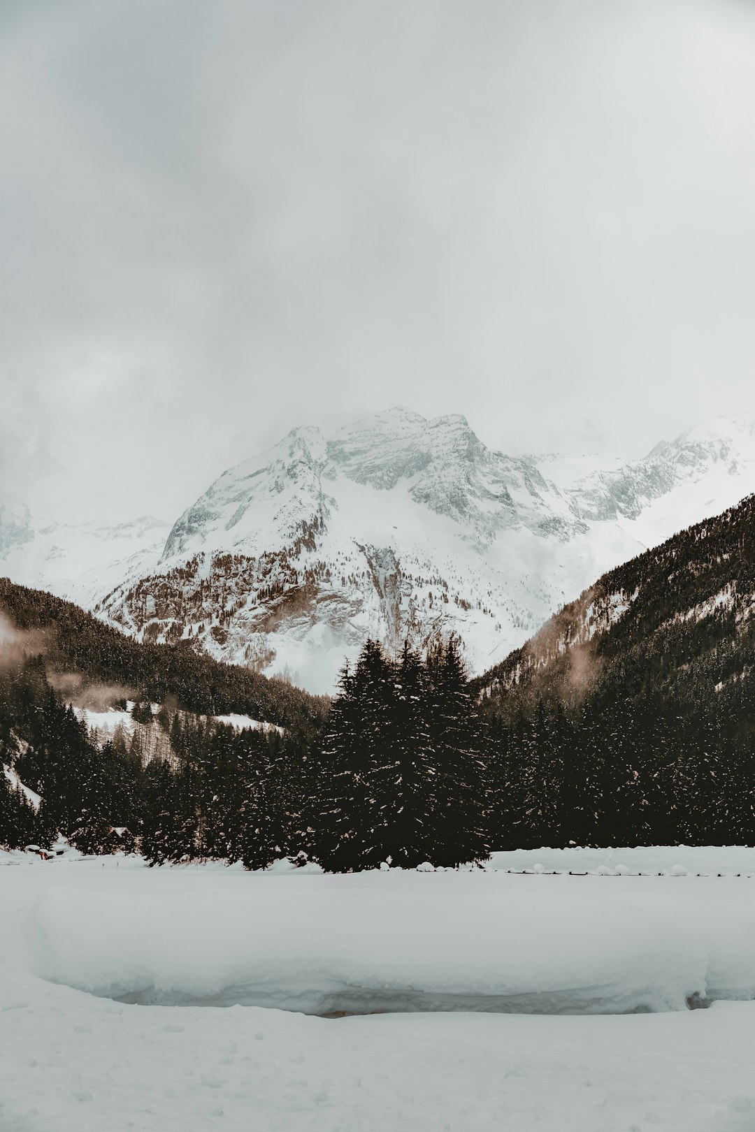 snow covered mountain during daytime