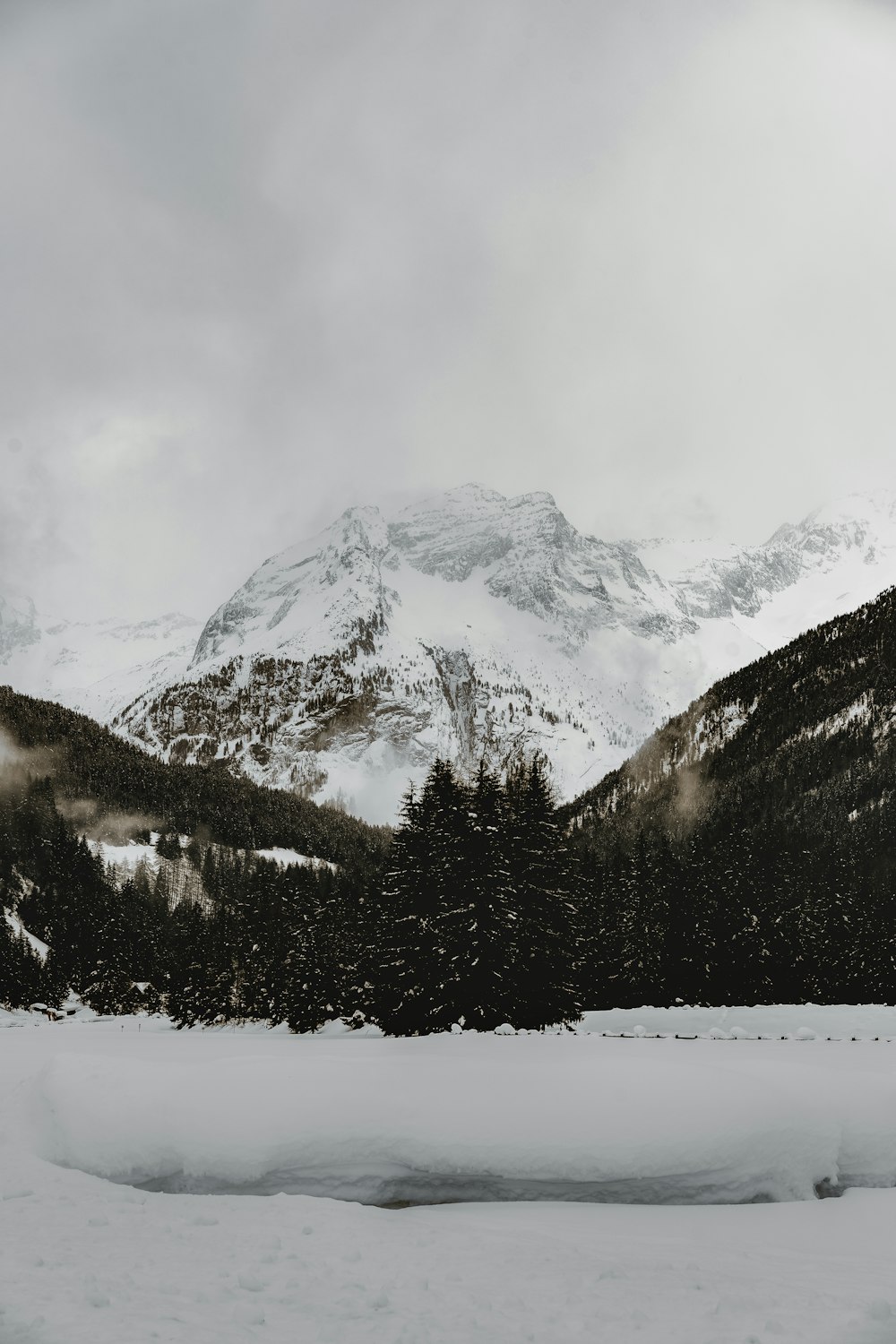 snow covered mountain during daytime