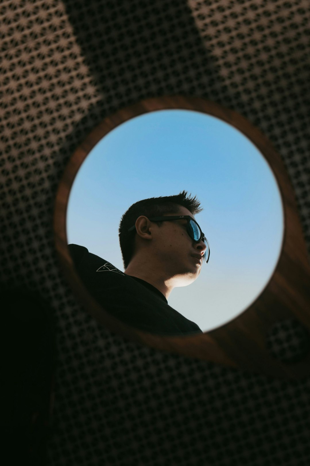 man in black shirt wearing sunglasses