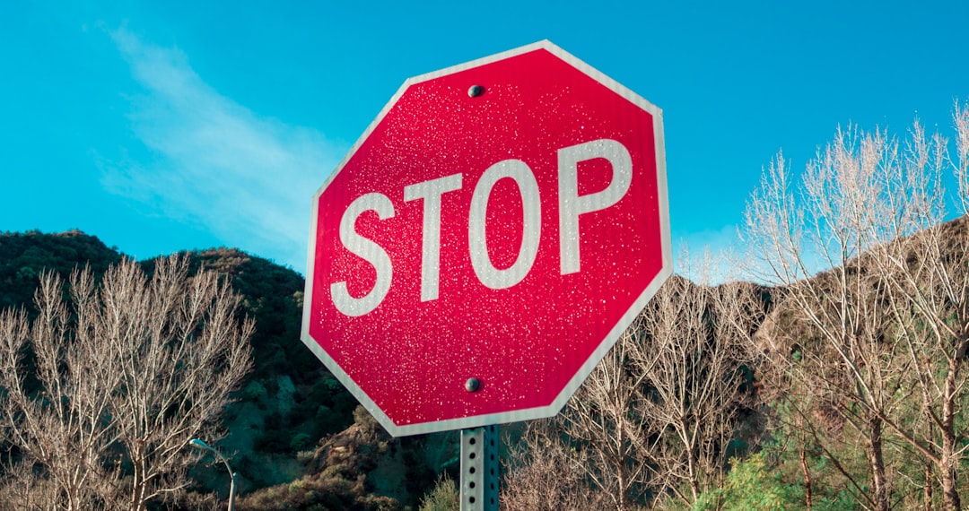 red and white stop sign
