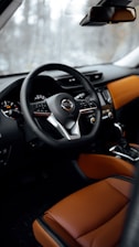 black and brown bmw steering wheel