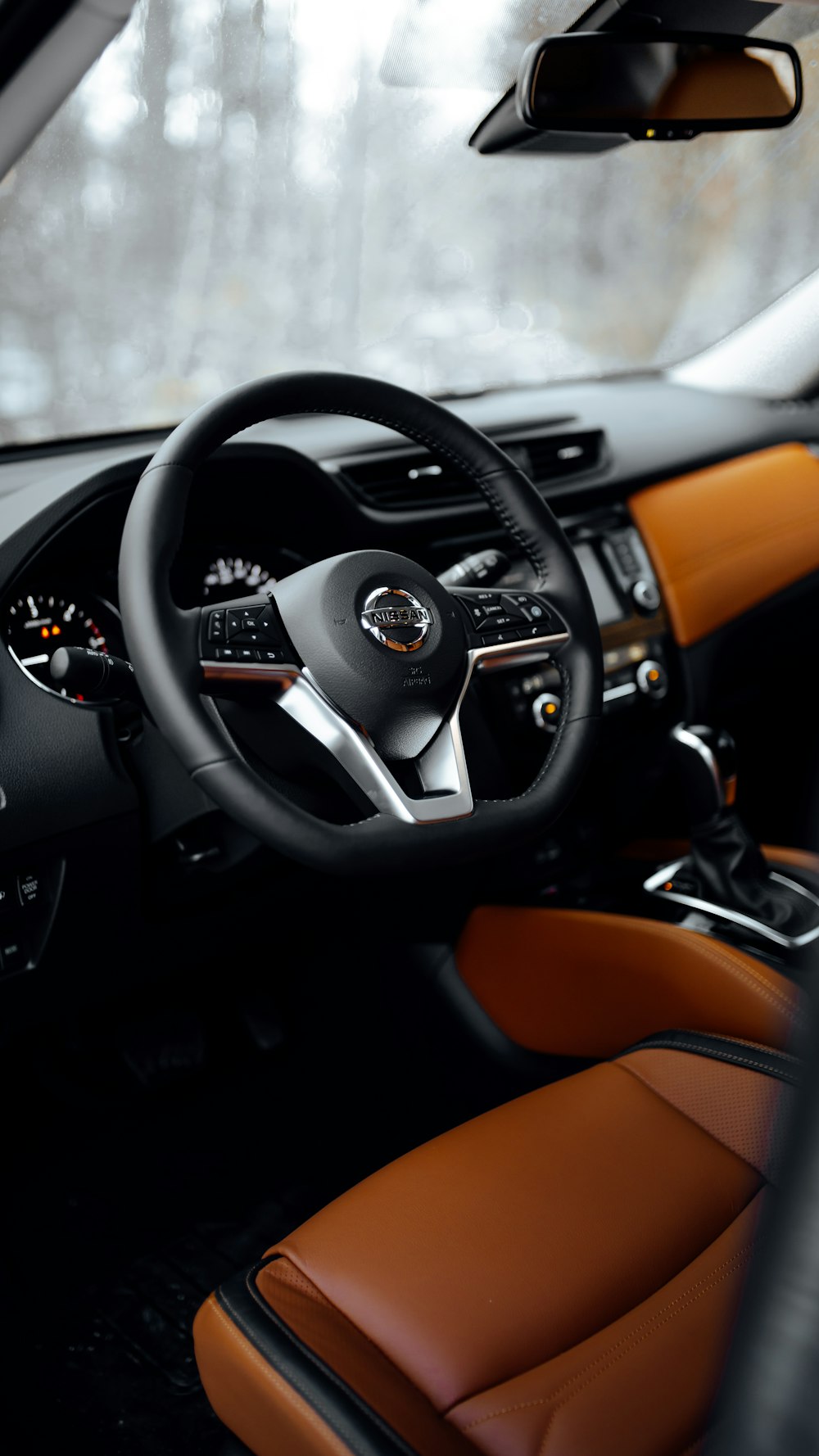 black and brown bmw steering wheel