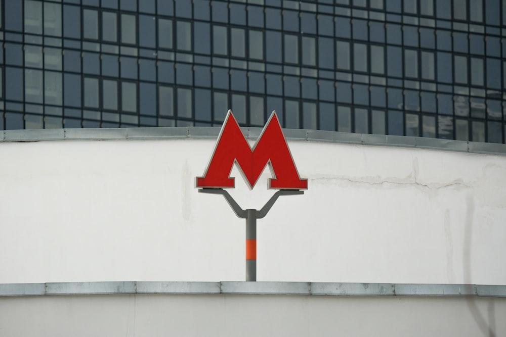red and white arrow sign
