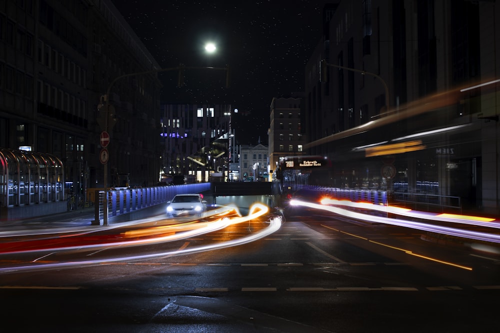 time lapse photography of cars on road during night time