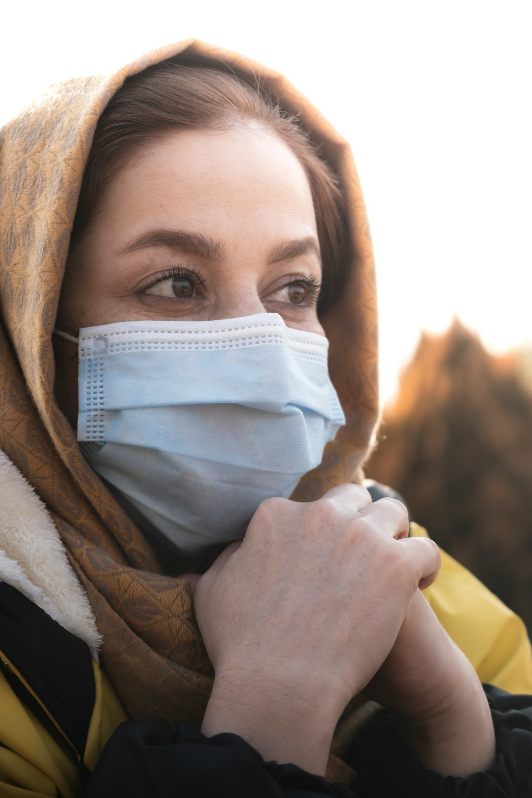 woman in white face mask