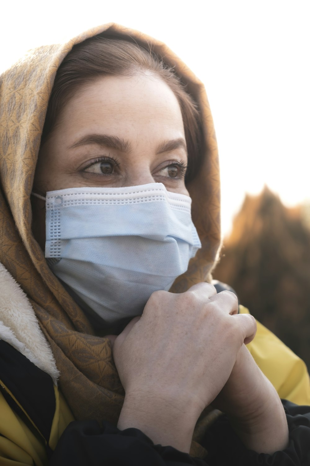 woman in white face mask