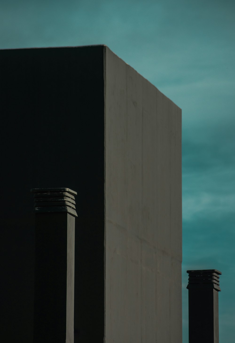 gray concrete building under blue sky during daytime