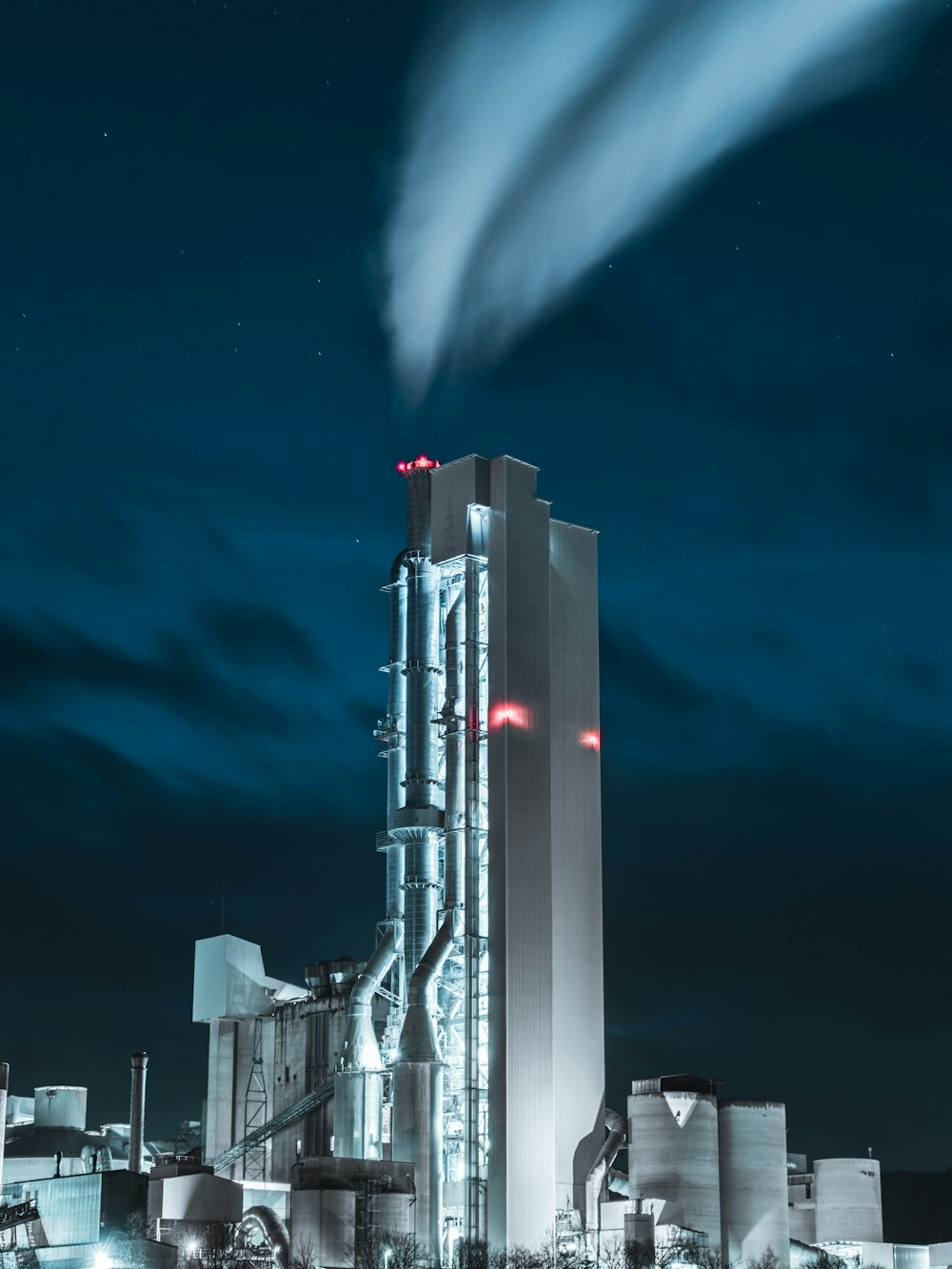 white and black concrete building under blue sky during nighttime