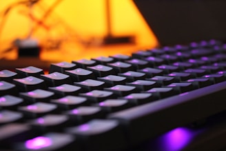 black and purple computer keyboard