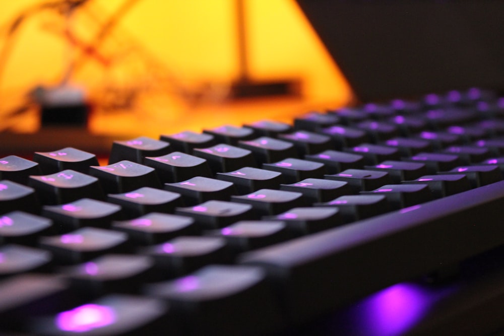 black and purple computer keyboard