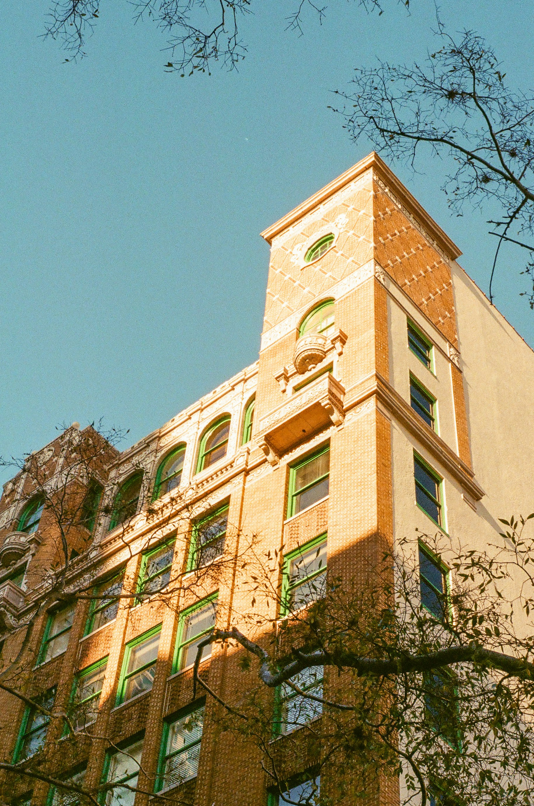 brown concrete building under blue sky during daytime