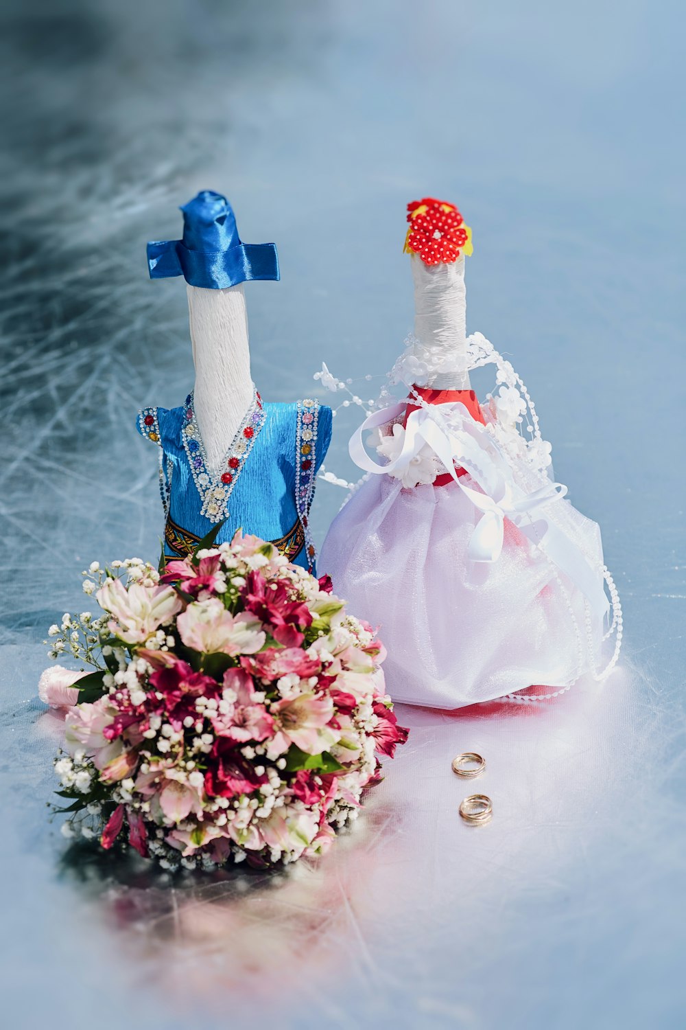 white and red christmas tree with blue gift box