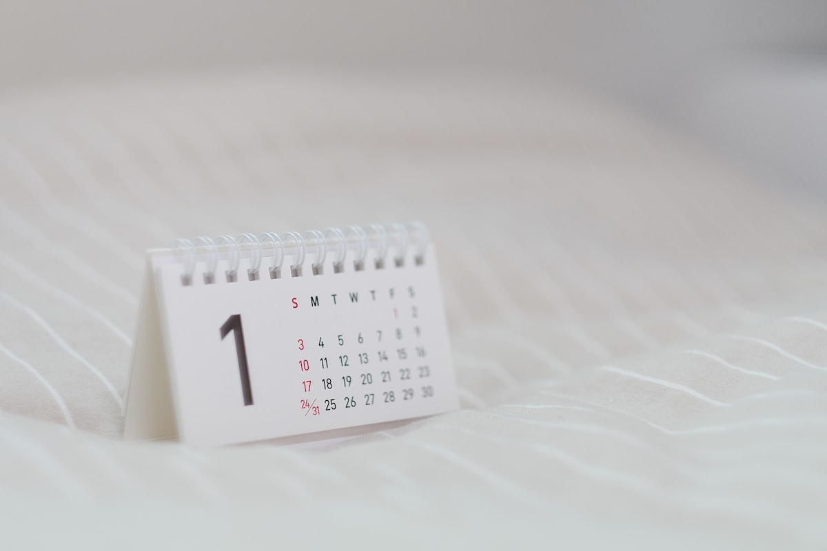 White calendar showing summer 2026 hotel booking planning dates