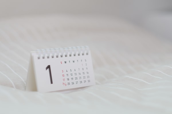 White calendar showing summer 2026 hotel booking planning dates