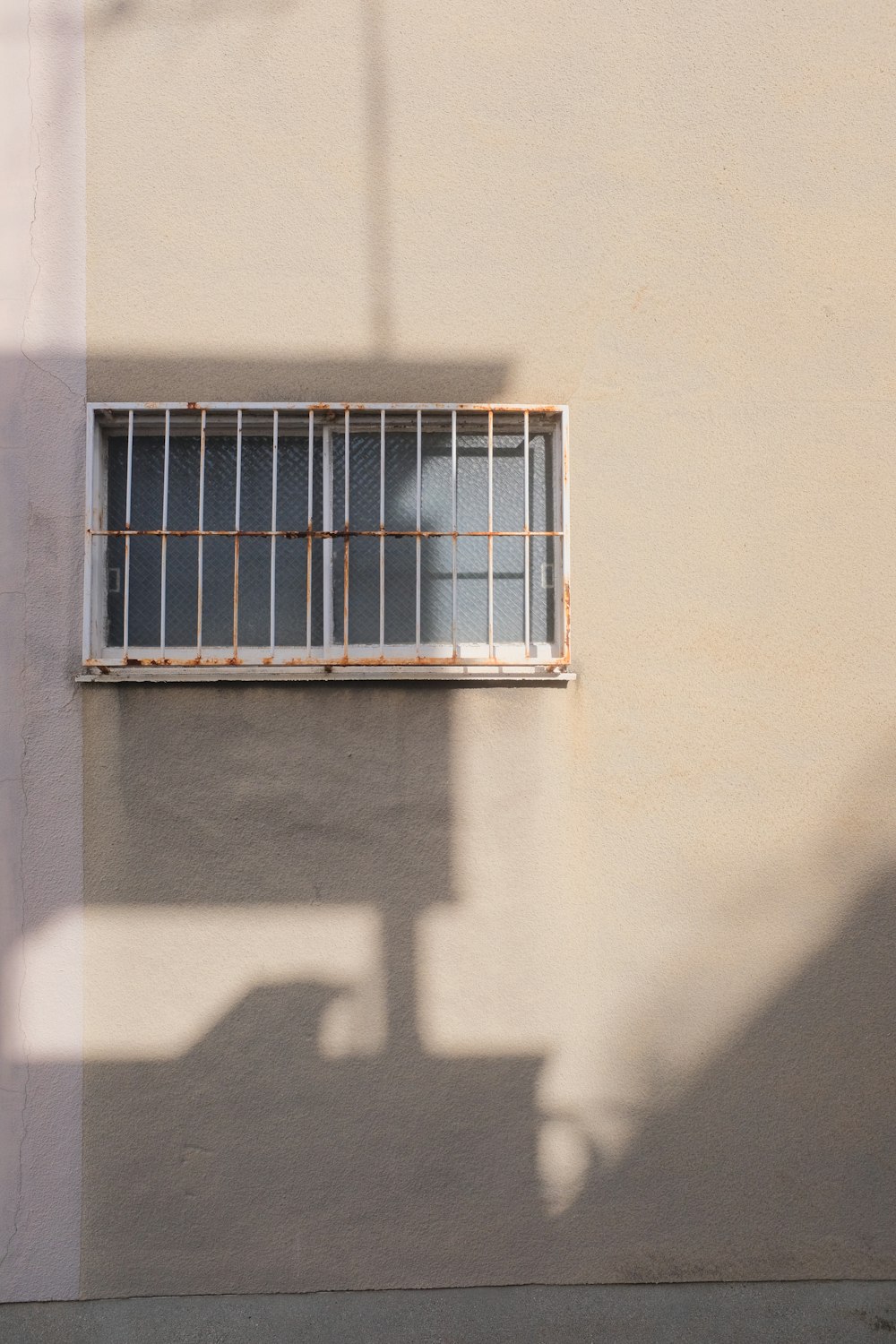 white window frame on white wall