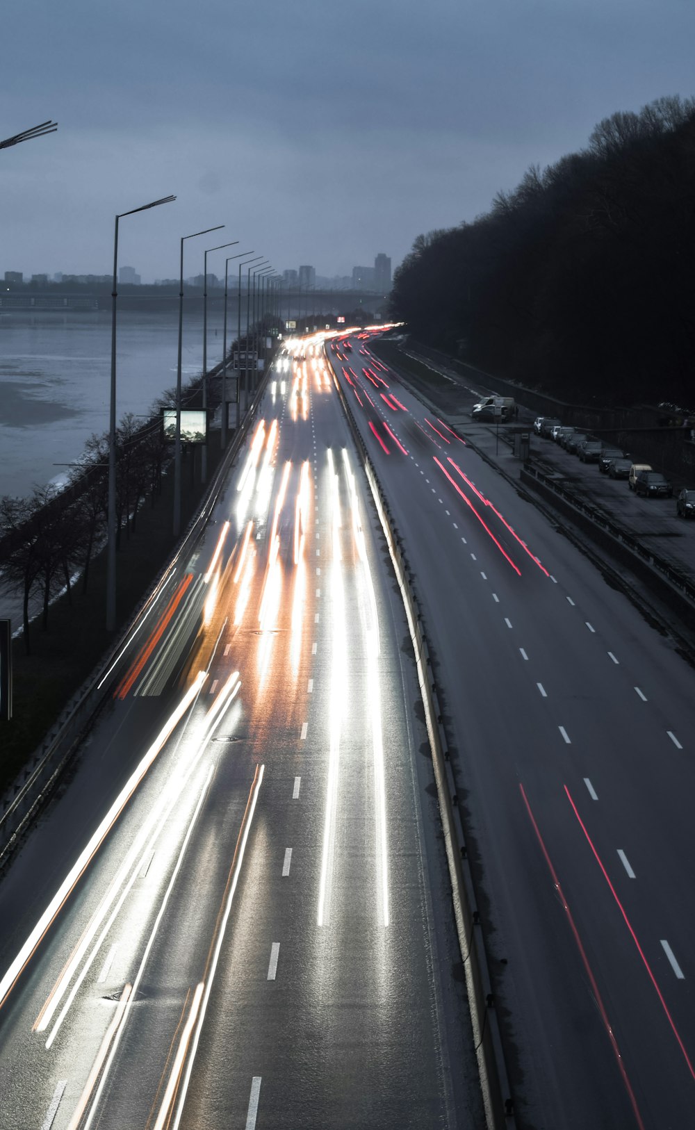 time lapse photography of cars on road during night time