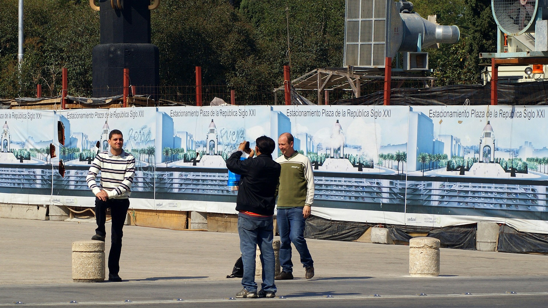 woman wearing yellow long-sleeved dress under white clouds and blue sky during daytime