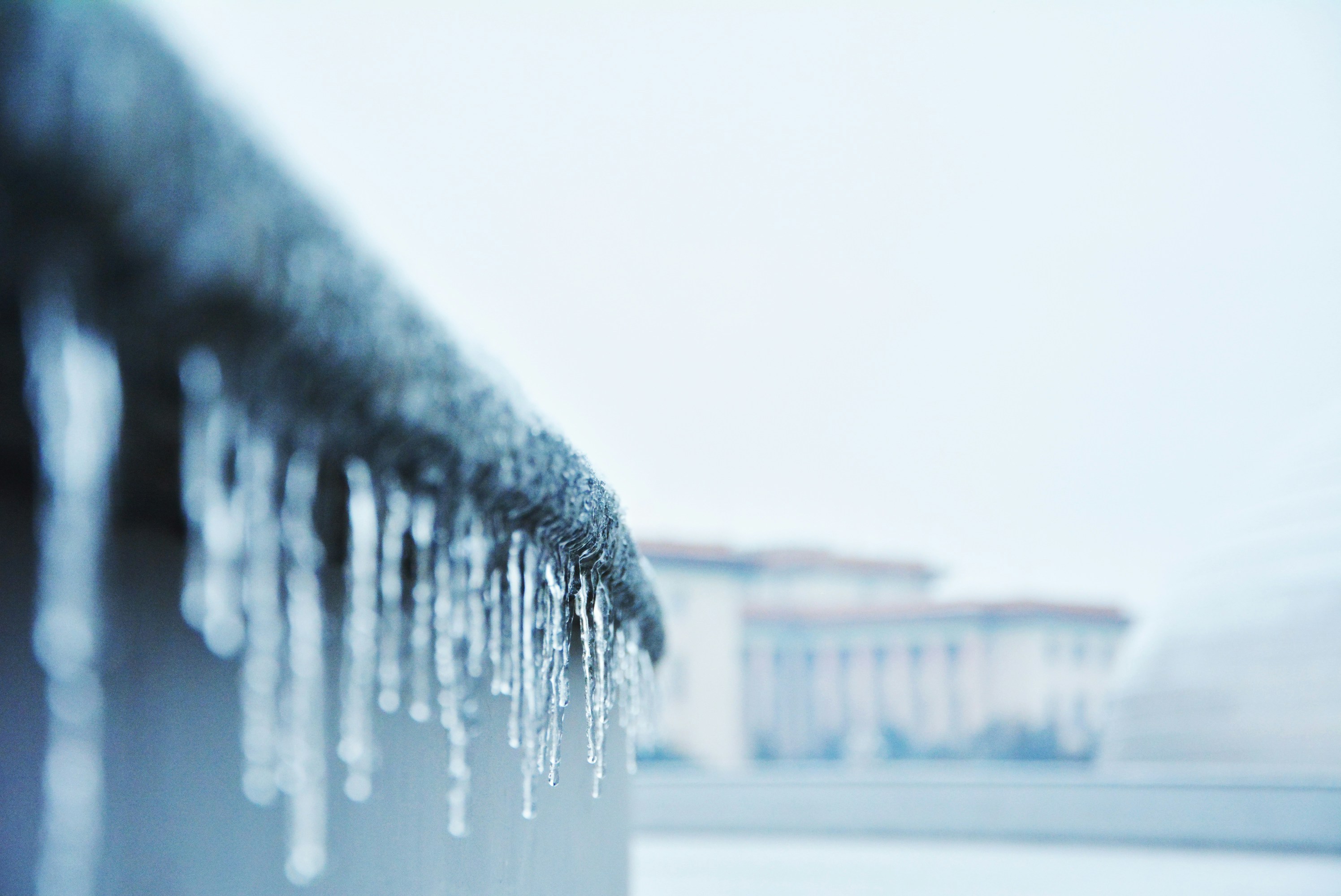water droplets on gray concrete wall