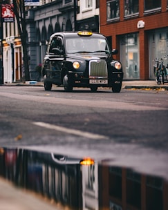 black car on road during daytime