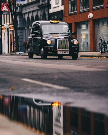 black car on road during daytime