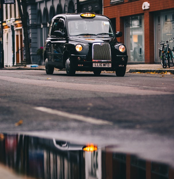 black car on road during daytime