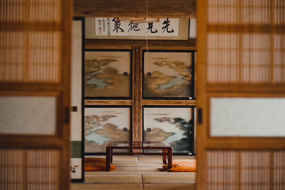 brown wooden framed glass window