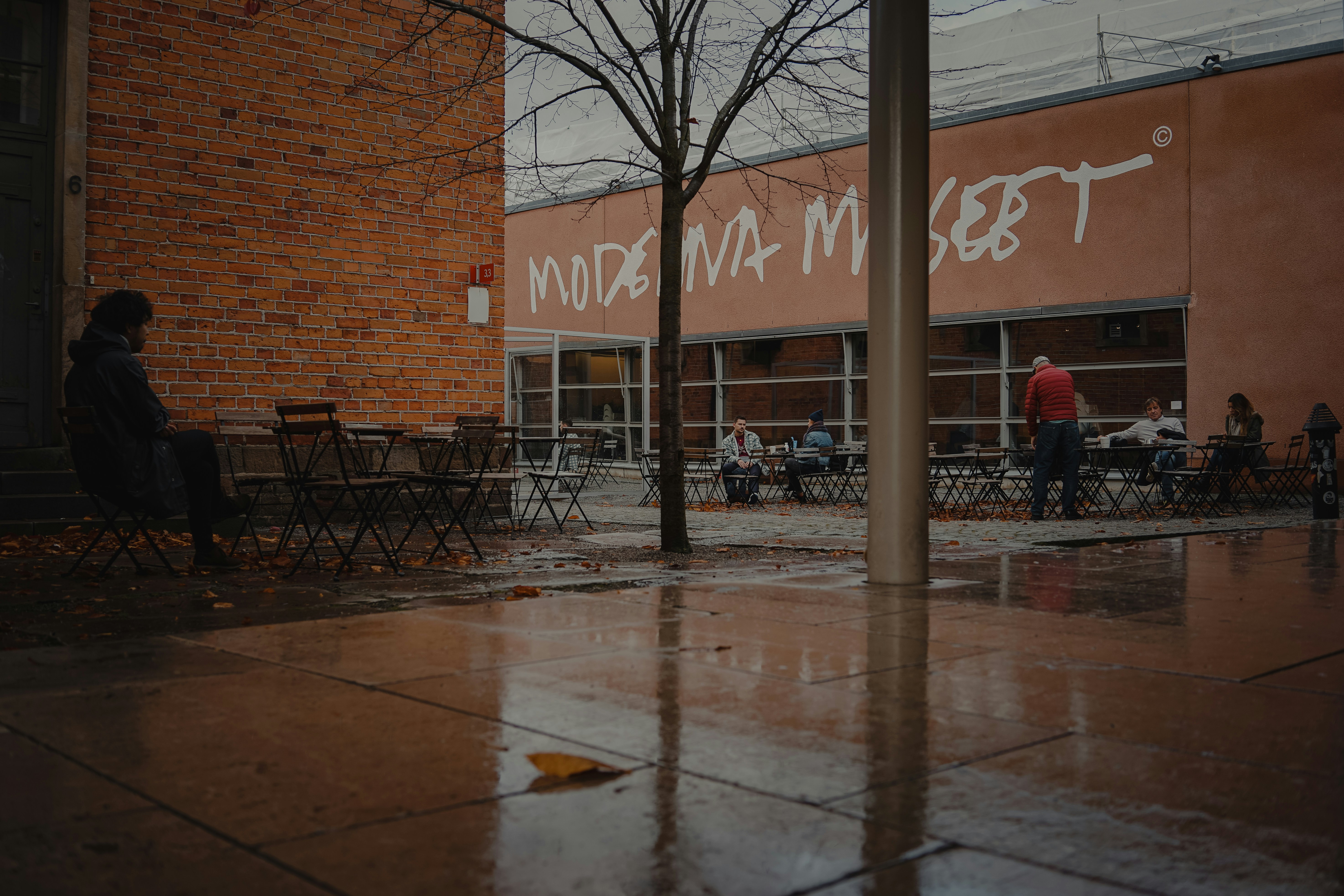 woman wearing yellow long-sleeved dress under white clouds and blue sky during daytime