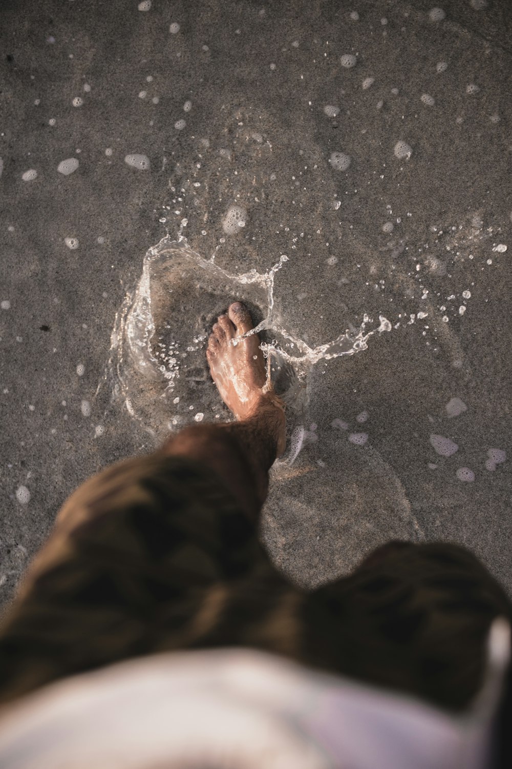 persons feet on water