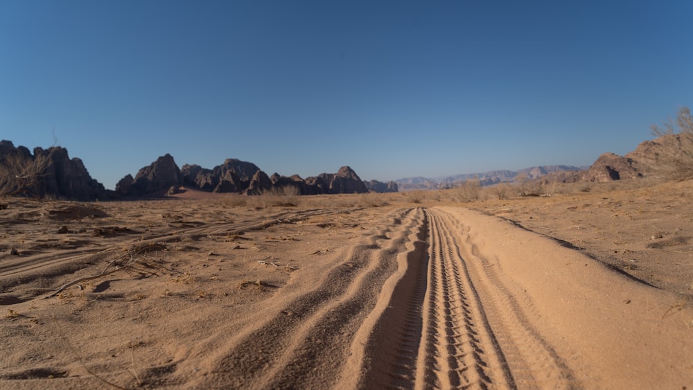 brown sand under blue sky during daytime