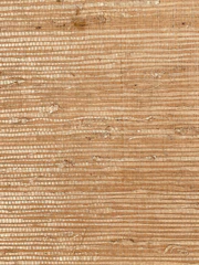 Close-up of natural textures: woven baskets, linen fabrics, and ceramic pottery in warm beige tones.