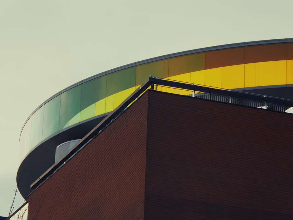 brown and black building under white sky during daytime