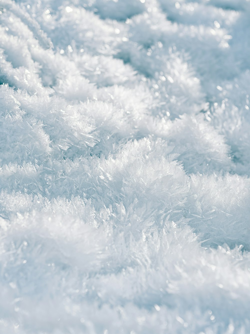 white snow on blue background