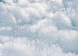 white snow on blue background