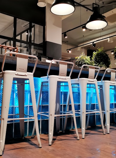 A stylish bar stool set against a modern backdrop.