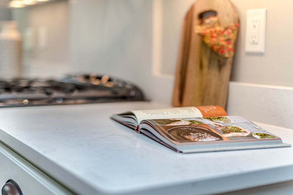 white book on blue table