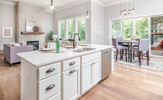 white wooden kitchen cabinet with sink