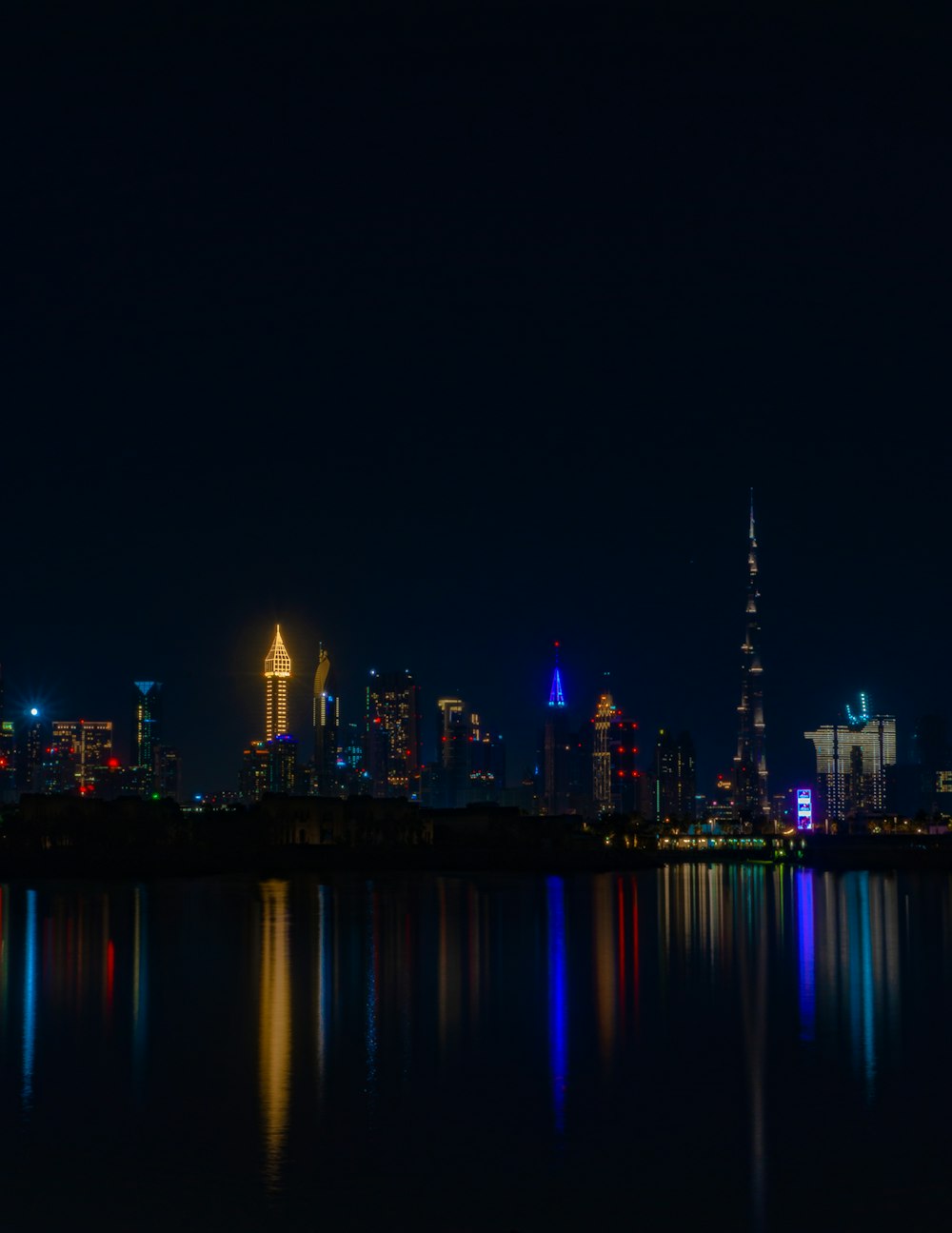 city skyline during night time