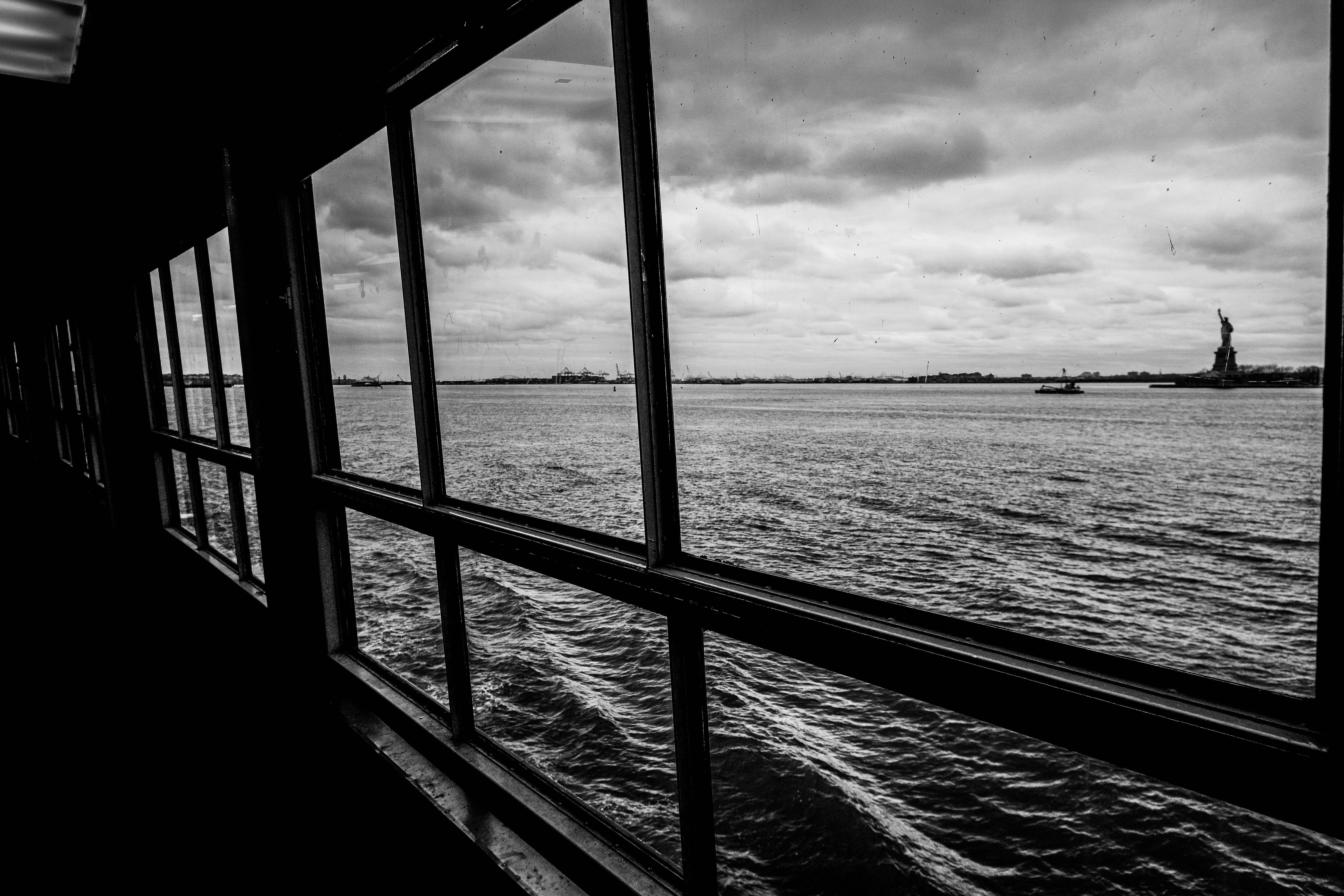grayscale photo of a beach