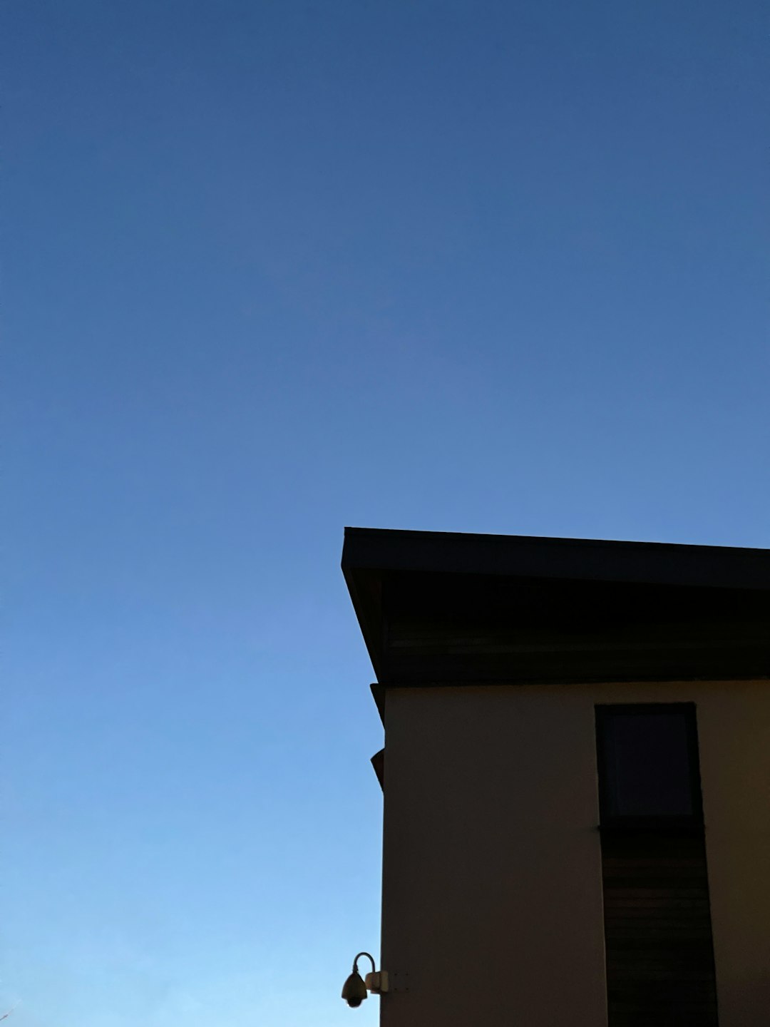 white concrete building under blue sky during daytime