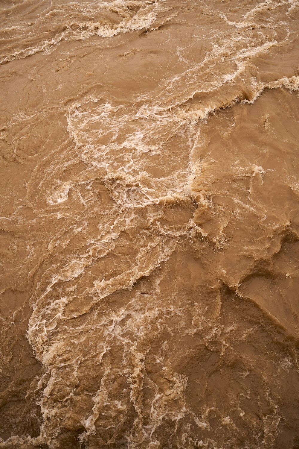 white and brown sea waves