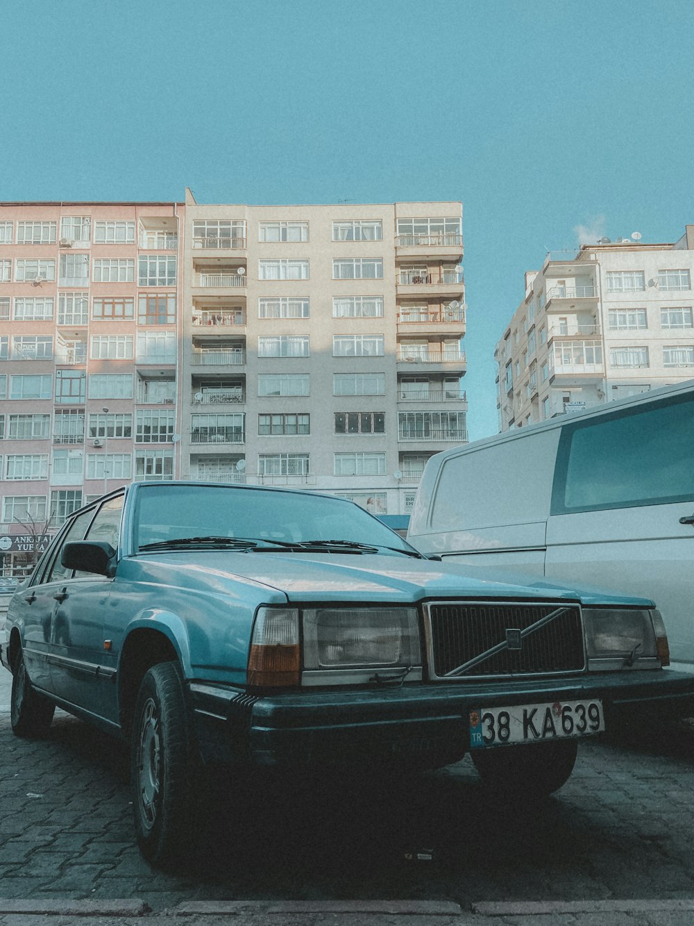 black car parked near building during daytime