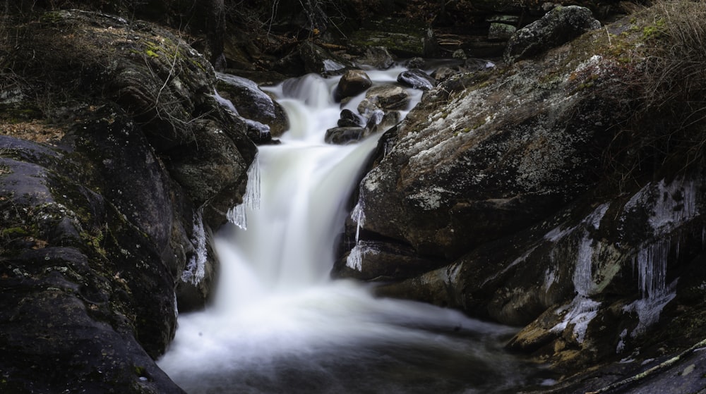 time lapse photography of water falls