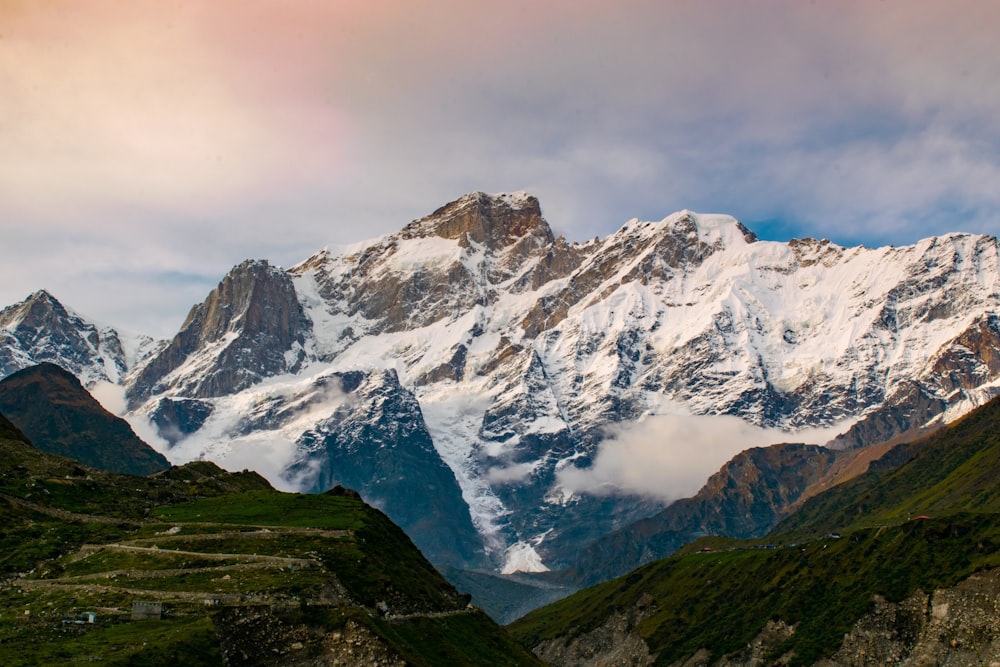 snow covered mountain during daytime