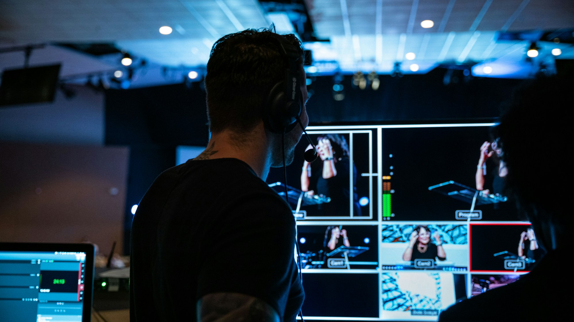 Church production director with headset during service 