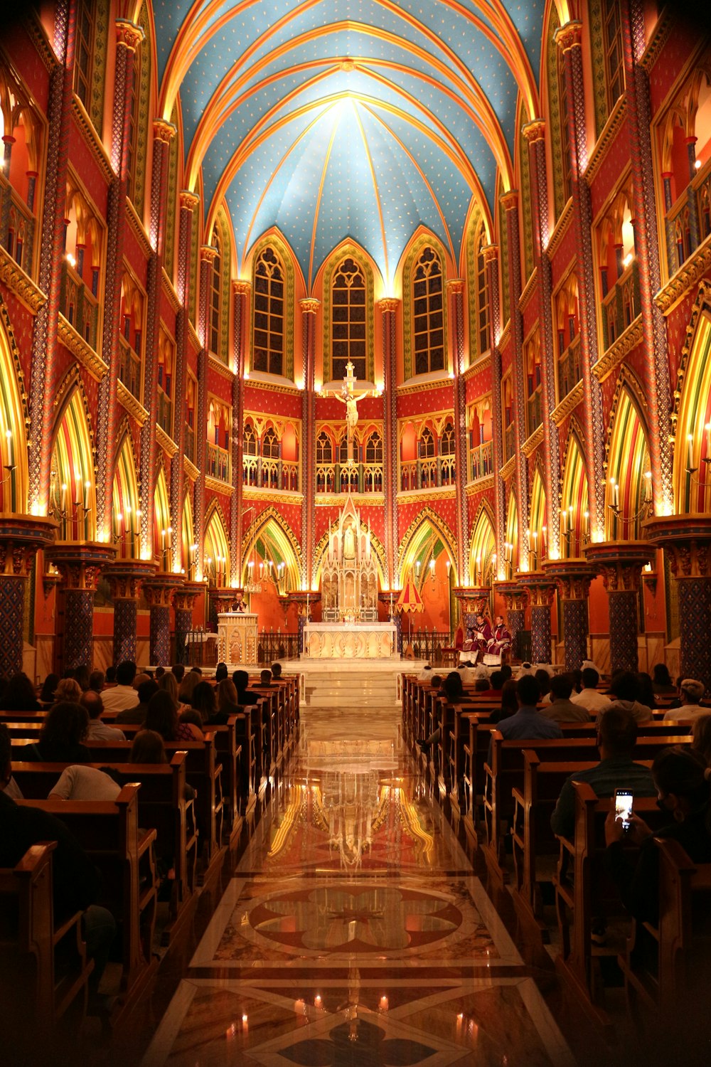 people sitting on chairs inside church